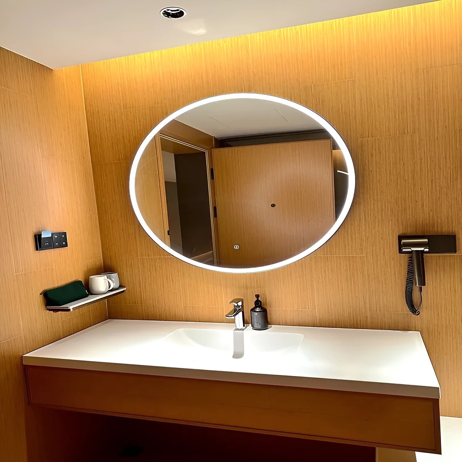 Round black aluminium frame LED bathroom mirror with touch control dimming lights.