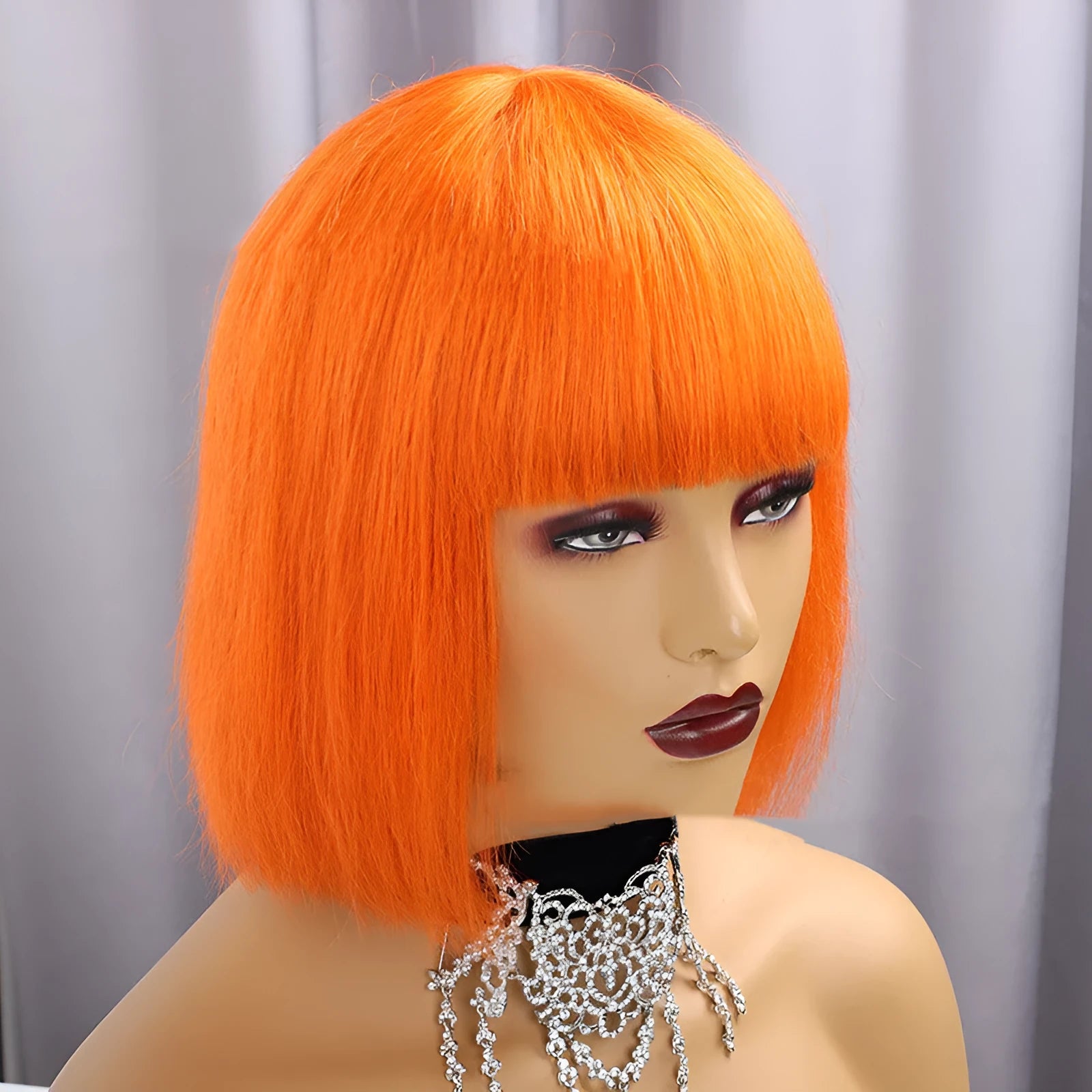 Real hair short straight wig with Qi bangs and full mechanism cap in 10 inch length on a mannequin head