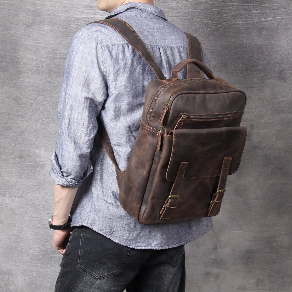 Retro crazy horse leather backpack in dark coffee colour with handmade stitching and front flap
