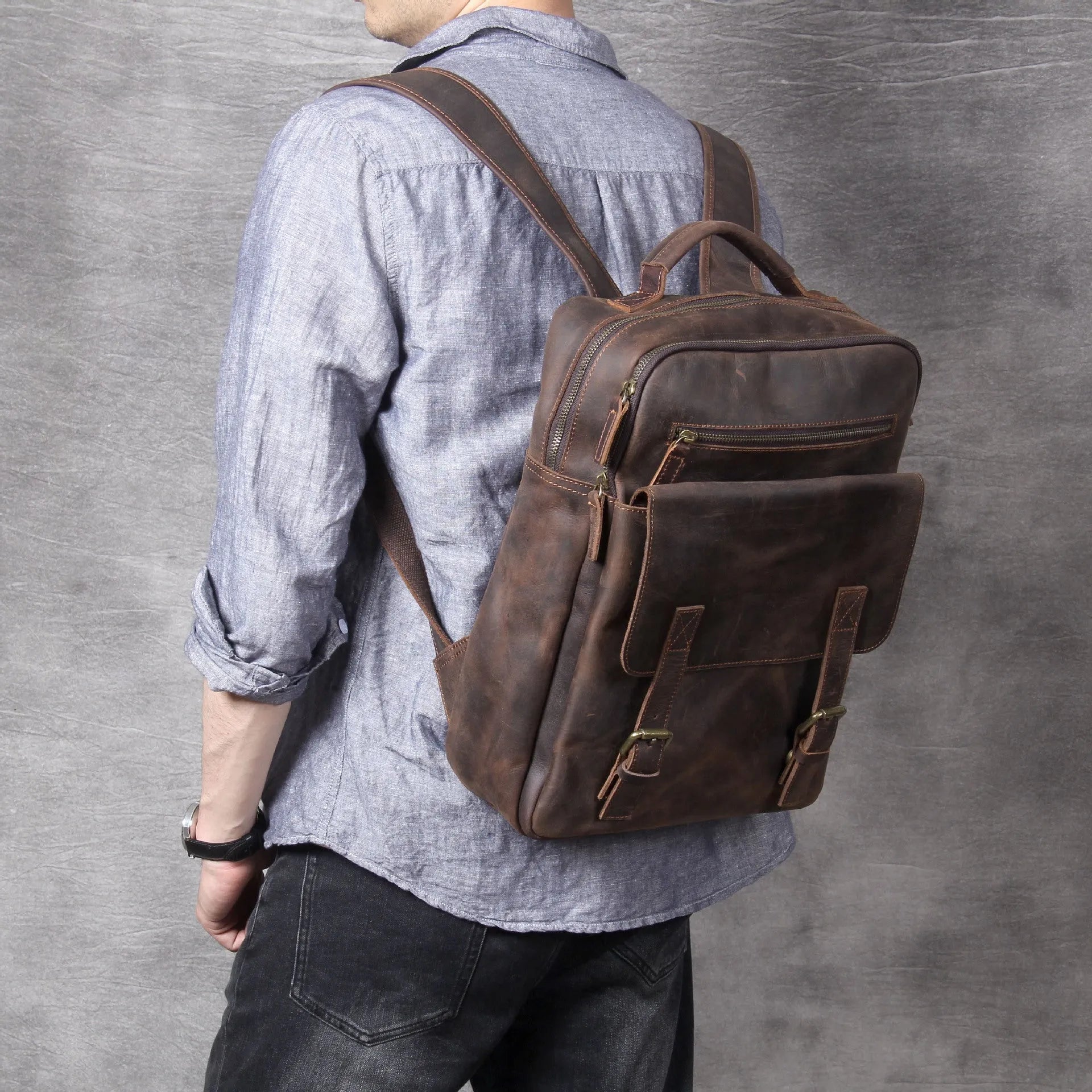 Retro crazy horse leather backpack in dark coffee colour with handmade stitching and front flap