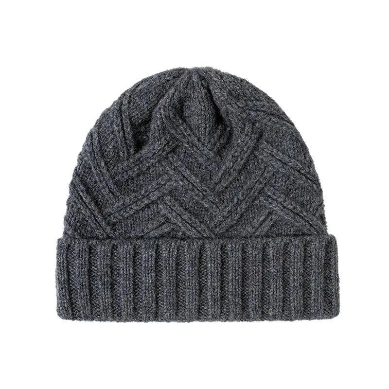 Women's wool knitted dome winter hat in ankela red colour showing thickened knitting texture
