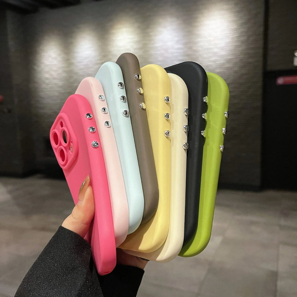Silicone solid colour electroplated phone case for iPhone in antique white showing button covers and camera cutout