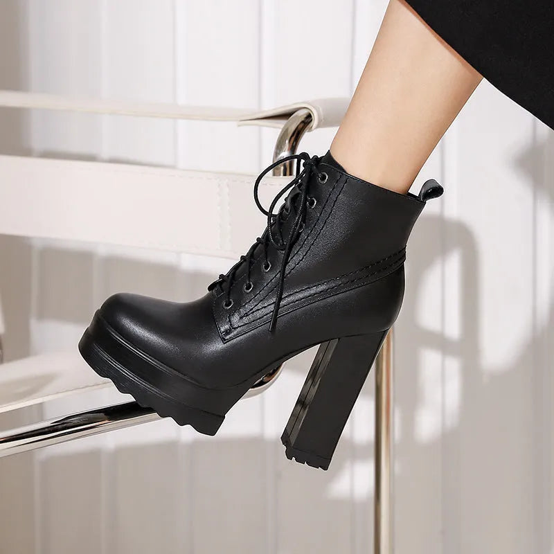 Women's chunky heel waterproof platform boots in black cowhide with side zipper and round toe