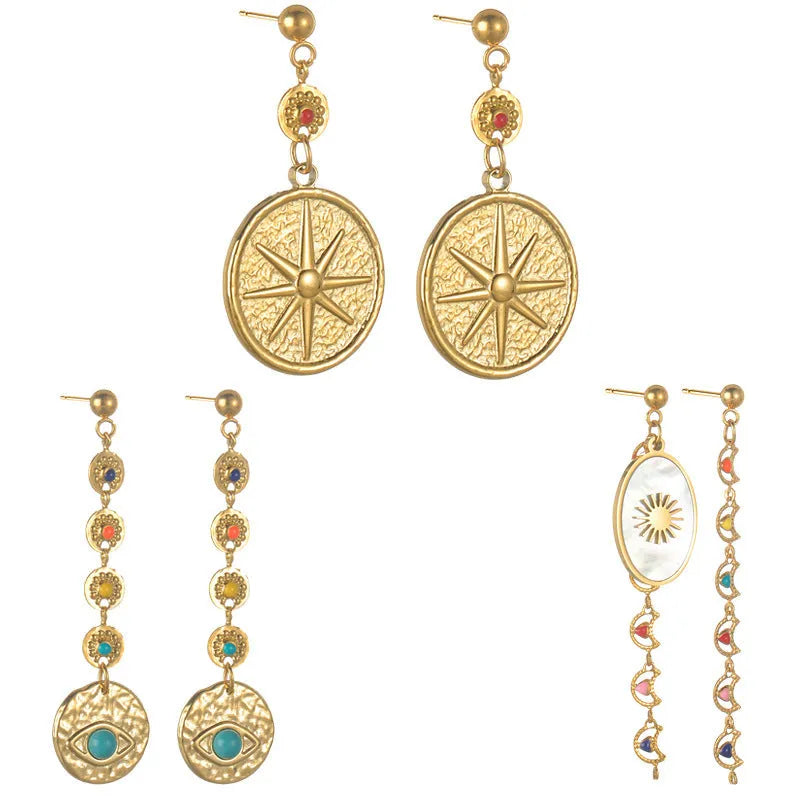 Geometric stainless steel earrings showing eight-awl-star, eye and shell-sun design variations