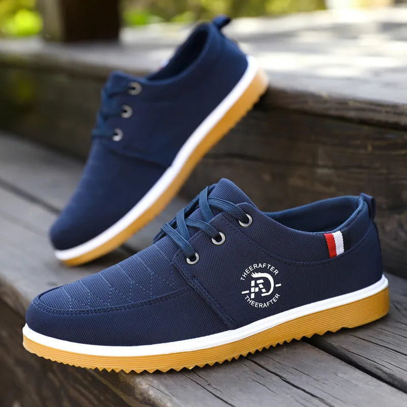 Non-slip men's casual work shoes in black canvas with platform heel and leather toe cap