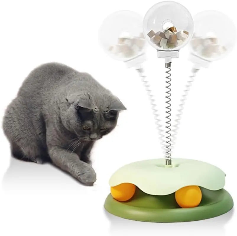 Blue interactive cat slow feeder toy with track and ball design on a white background