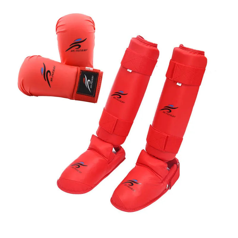 Red martial arts protective gear set including leg guard, helmet and gloves for karate and taekwondo training
