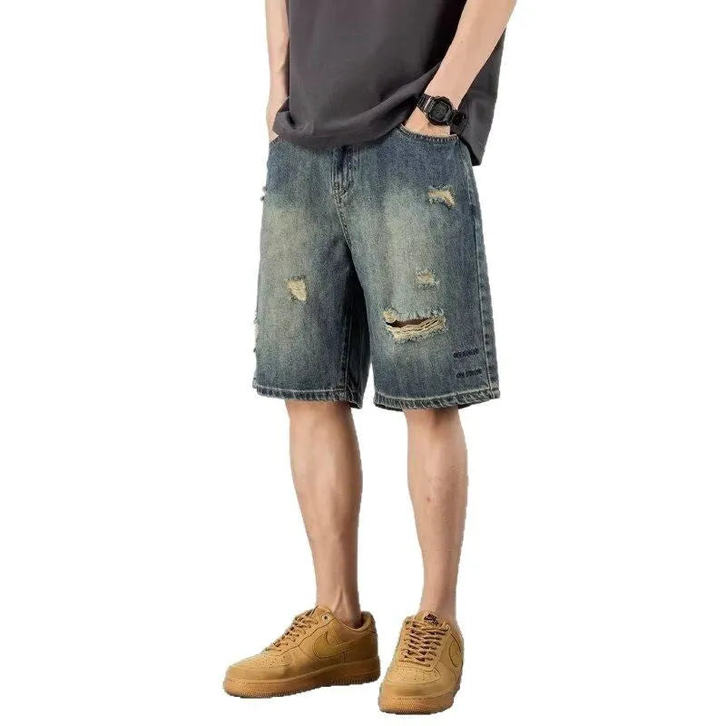 Men's blue denim shorts with loose hole retro styling and straight cut design