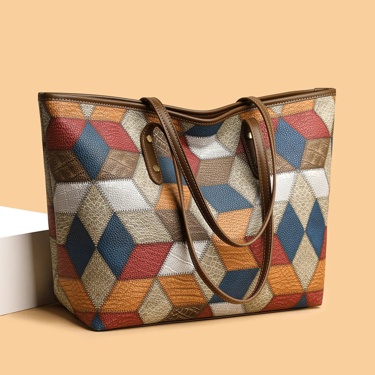 Women's PVC shoulder handbag with sandwich pocket design in blue brown colour