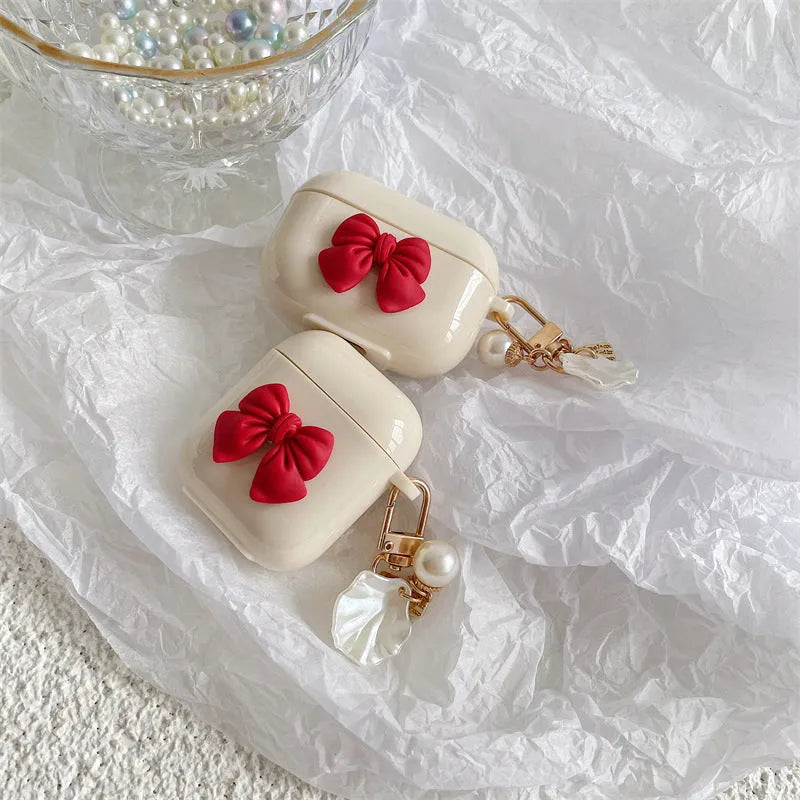 Beige red bow shell TPU case for AirPods Pro wireless earphones with clamshell design