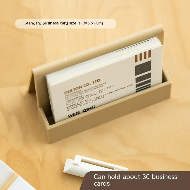 Creative business card storage display stand in geometric PS material, holds 20 cards, available in six colours