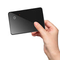 Black pet tracking locator card with wireless charging and NFC, constructed from ABS and glass, 85x54x2.1 mm