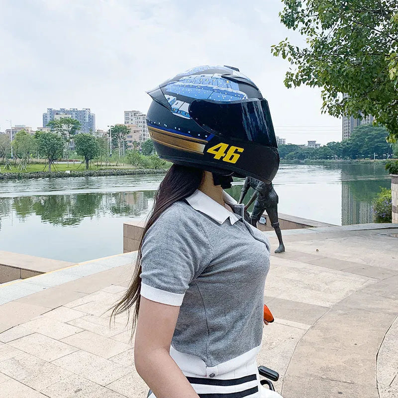 Men's and women's winter motorcycle helmet with ABS shell in dragon graphic colour on white background