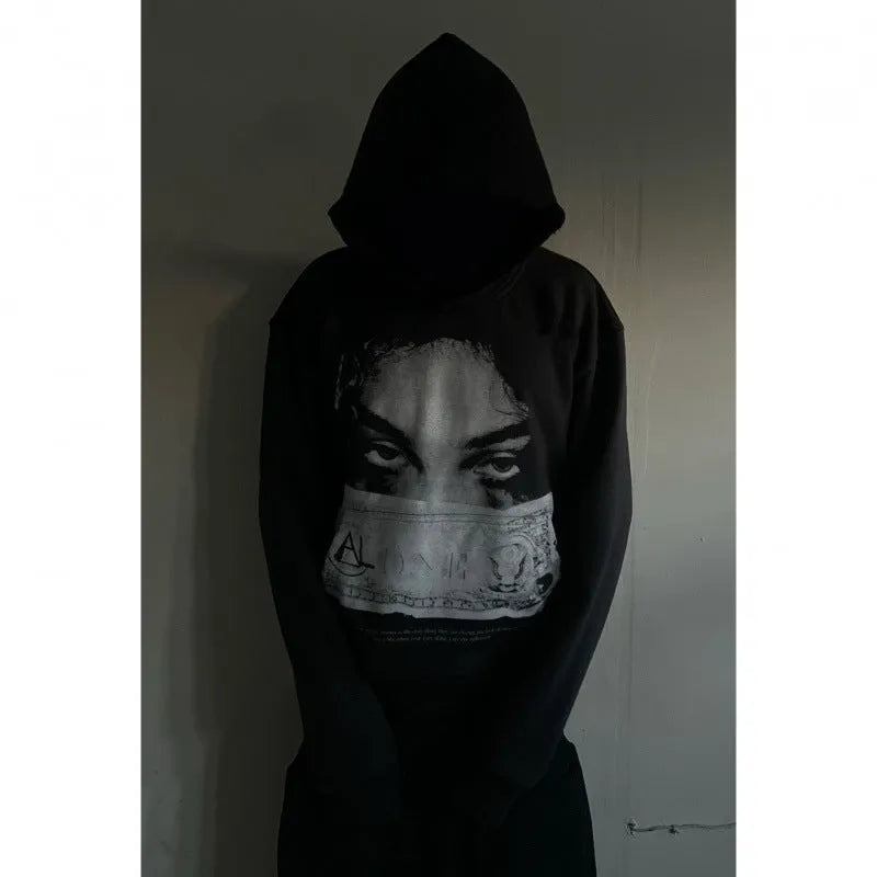 Women's loose fit black polyester hoodie with dark printed cartoon pattern front view