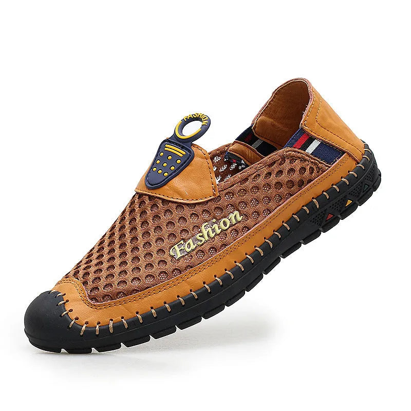 Men's brown breathable mesh casual shoes with round toe and rubber sole on a plain background.