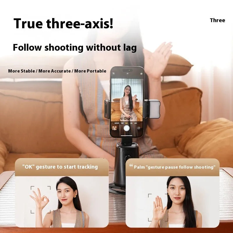Black desktop phone bracket with intelligent face tracking camera and LED ribbon lights, remote control on desk