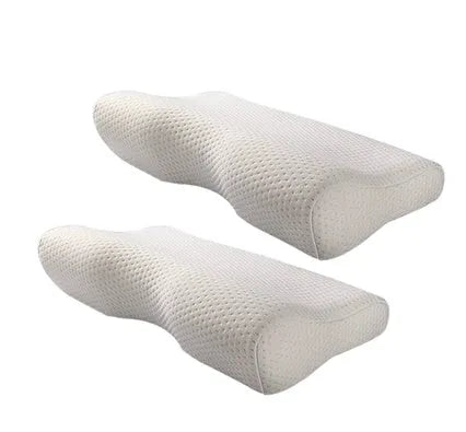 Cervical pillow with memory cotton and butterfly shape in blue, 50x30cm size, on a bed