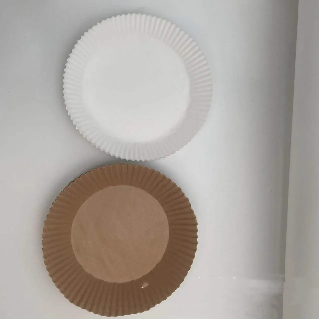 White round disposable food-grade parchment air fryer liner with 4.5cm raised edge, 16cm diameter