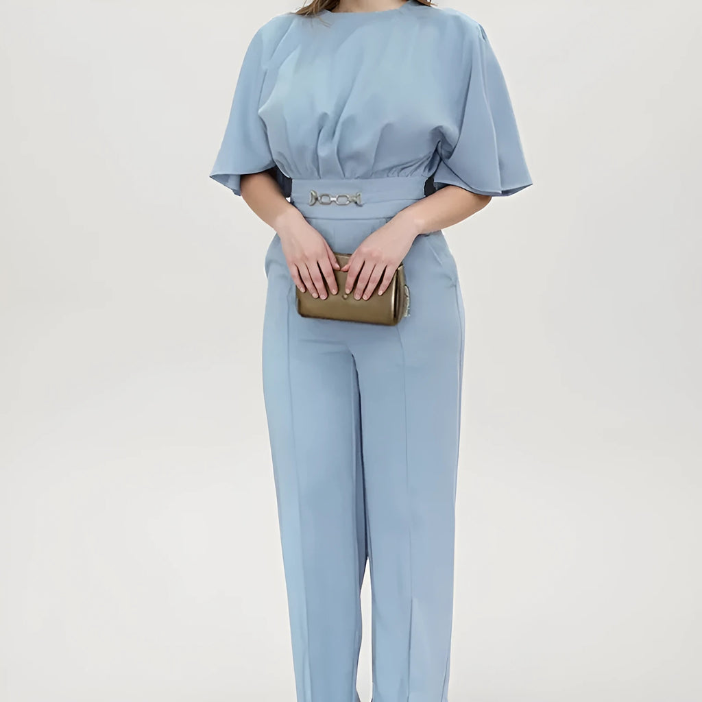 Blue polyester casual suit set with long sleeve top and trousers on a hanger