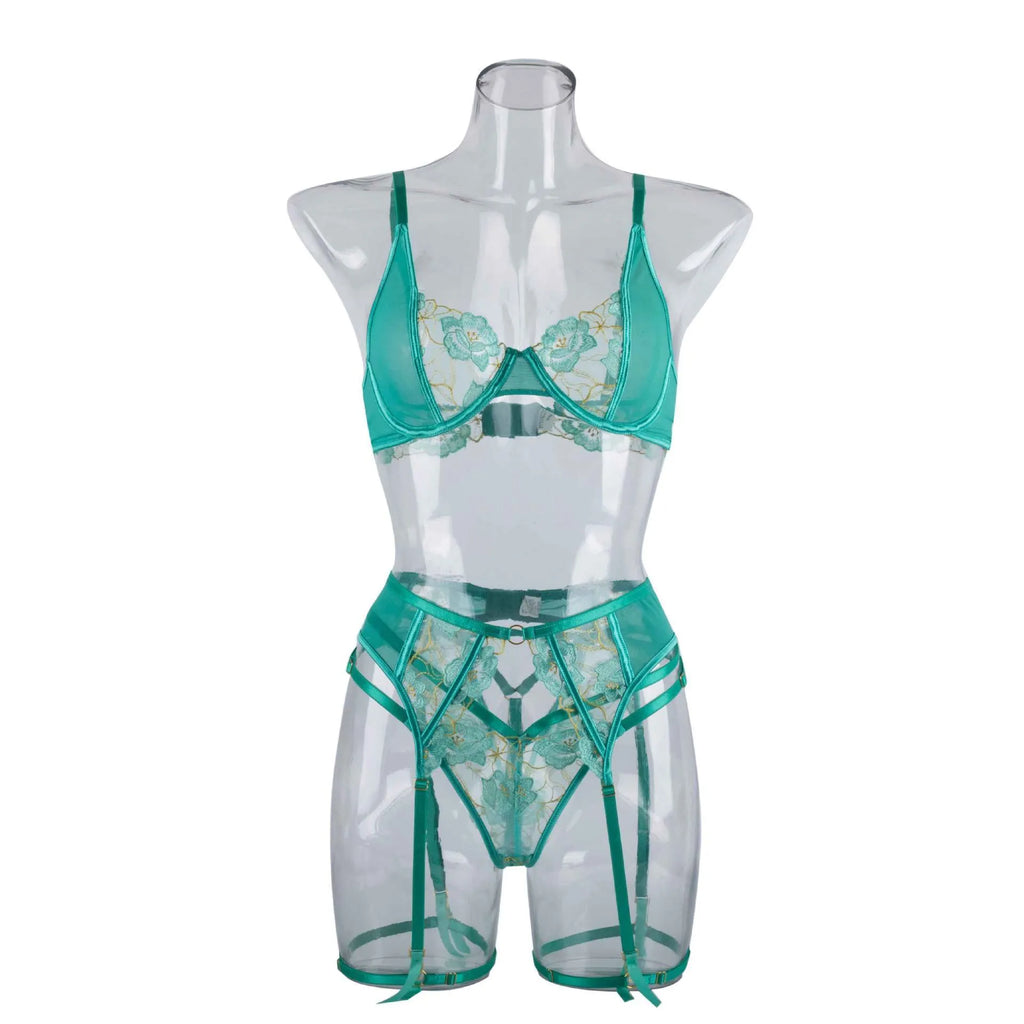 Women's light green polyester embroidered bra set with three-point tights on white background