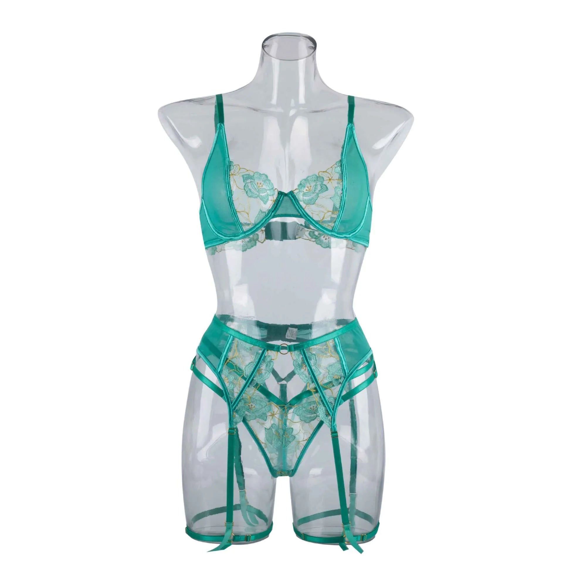 Women's light green polyester embroidered bra set with three-point tights on white background