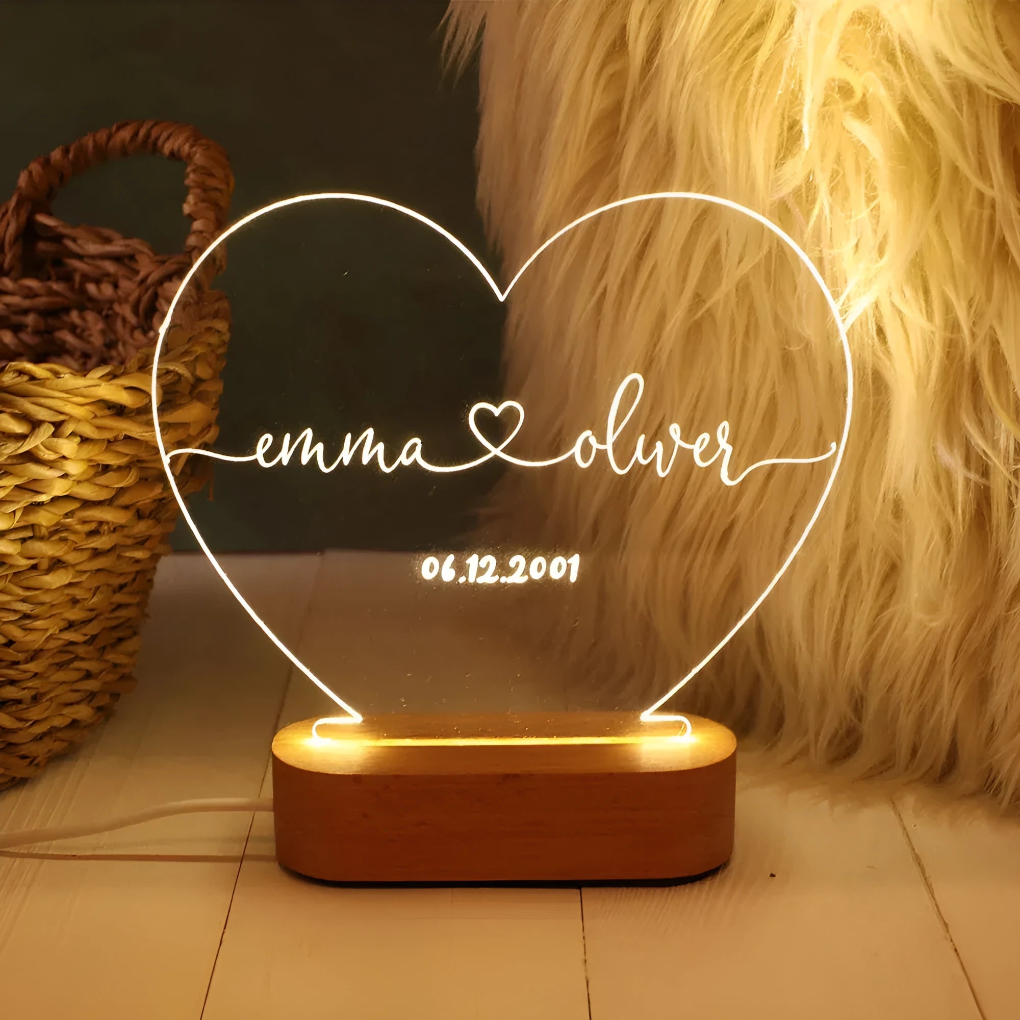 Custom acrylic LED night light displaying engraved names and dates on clear 20cm by 11.5cm panel