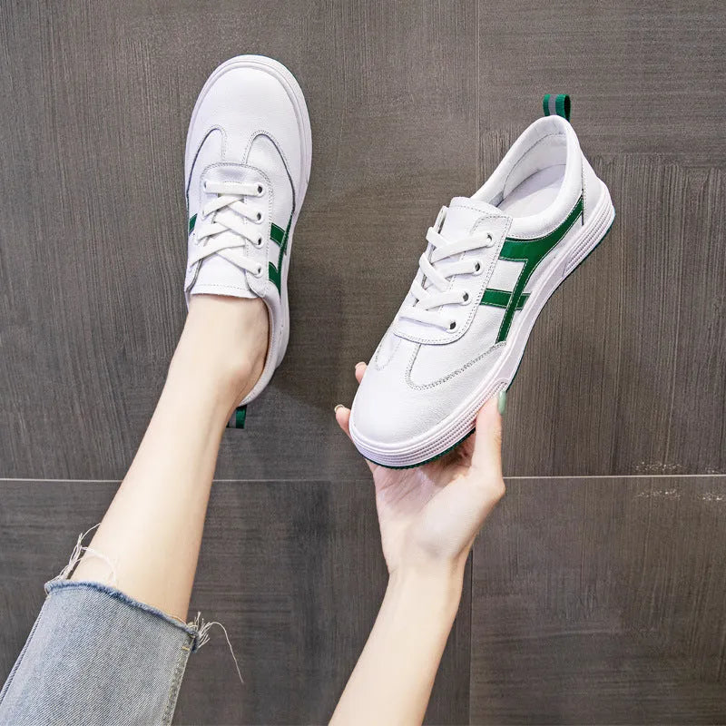 White and black casual Korean style low-top sneakers with sequin detailing, first layer cowhide upper, elastic band closure, and rubber sole
