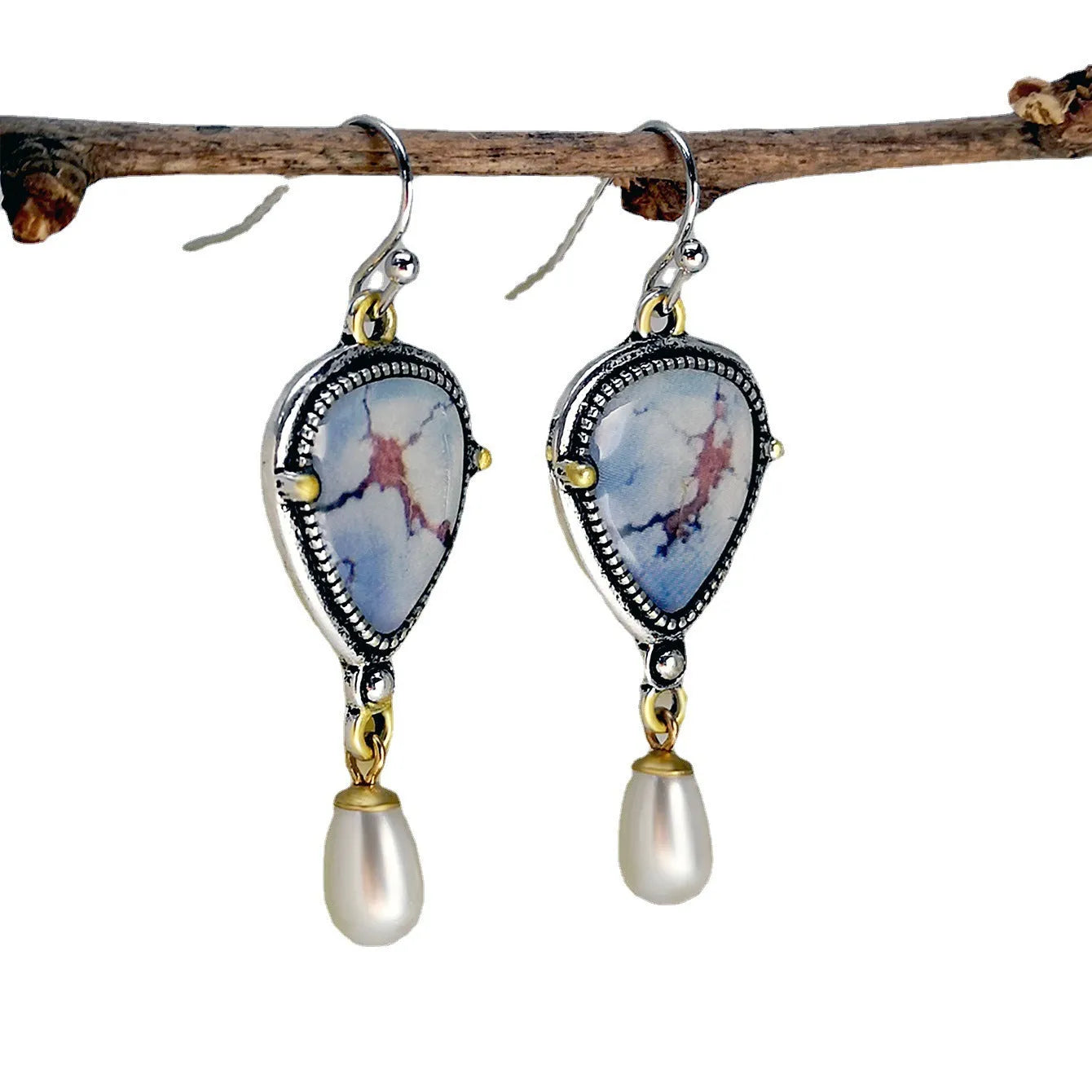 Retro blue geometric drop earrings with synthetic opal and pearl detailing on two-tone electroplated metal