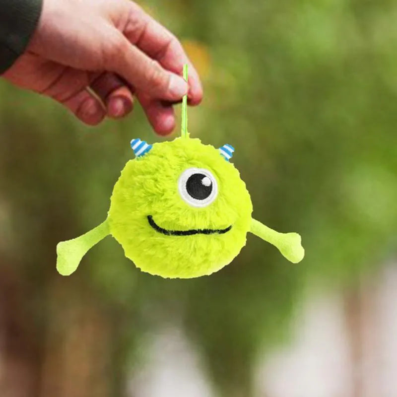 Green interactive dog teething toy ball with sound, 12cm diameter, plush and TPR construction
