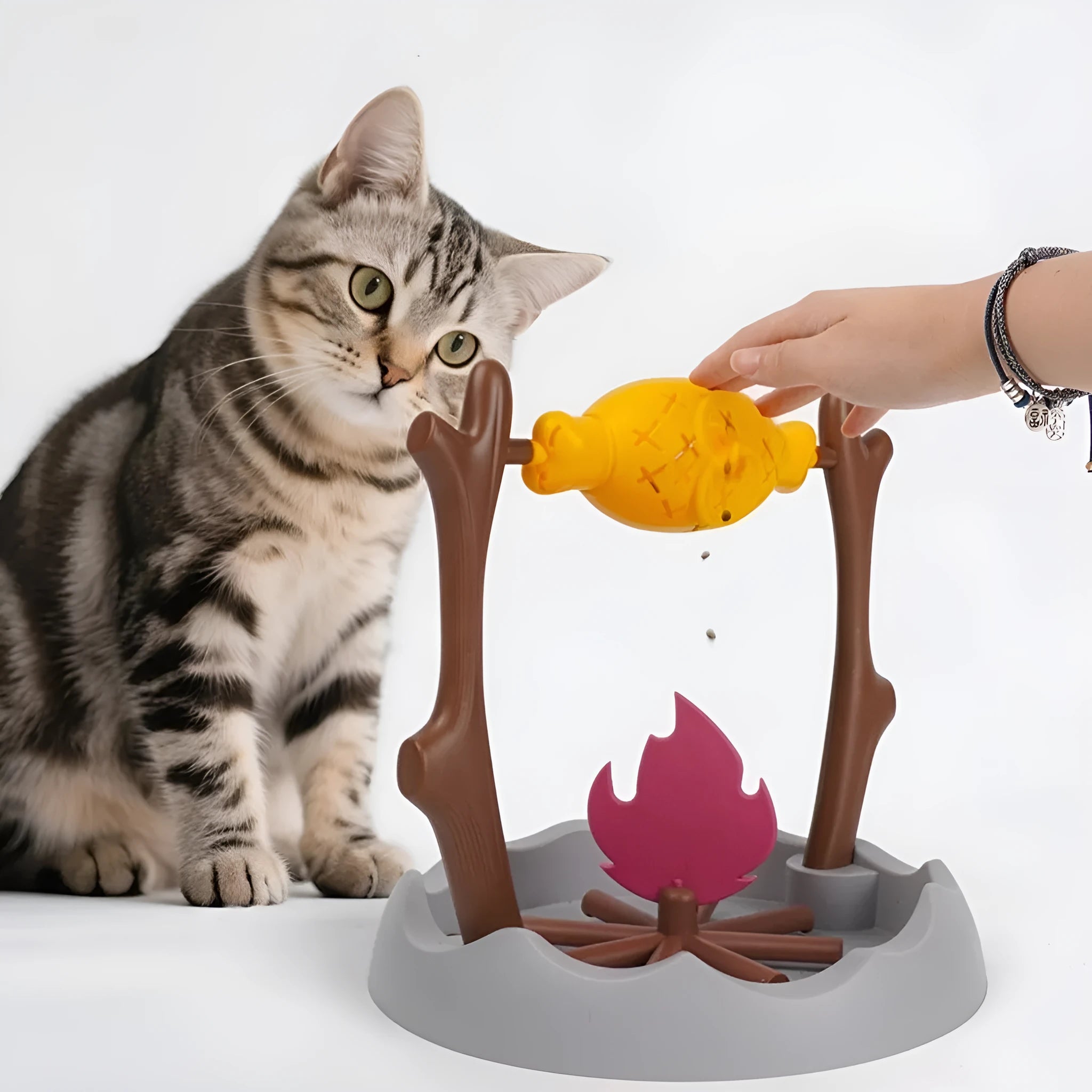 Barbecue-style tumbling cat food feeder toy measuring 30cm with plastic construction
