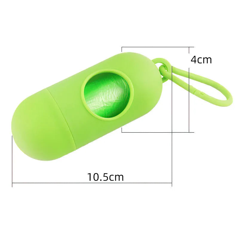 Compact black dog waste bag dispenser holder with metal hook and Velcro strap.