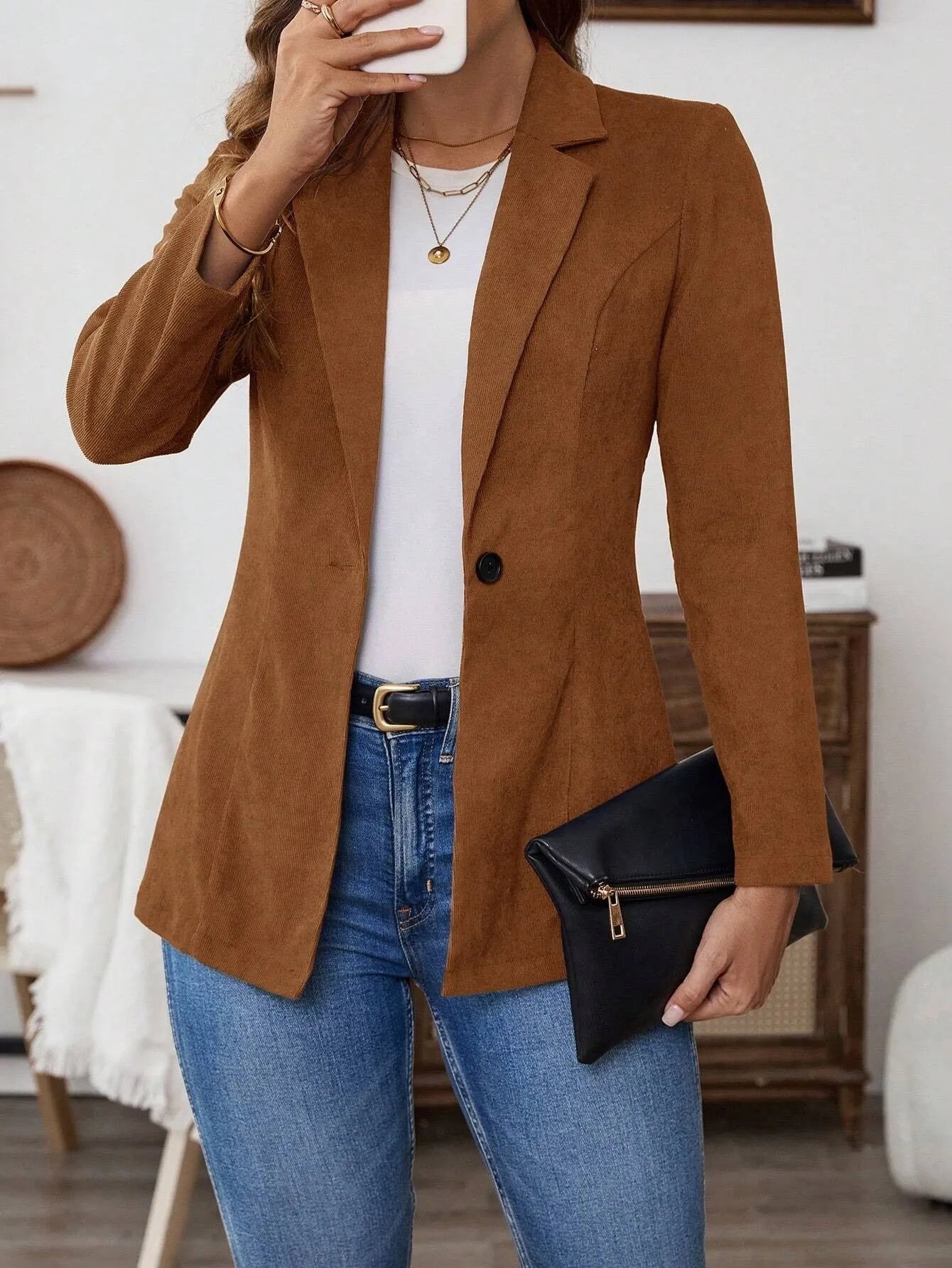 Brown single-breasted men's leisure suit coat with lapel collar and long sleeves