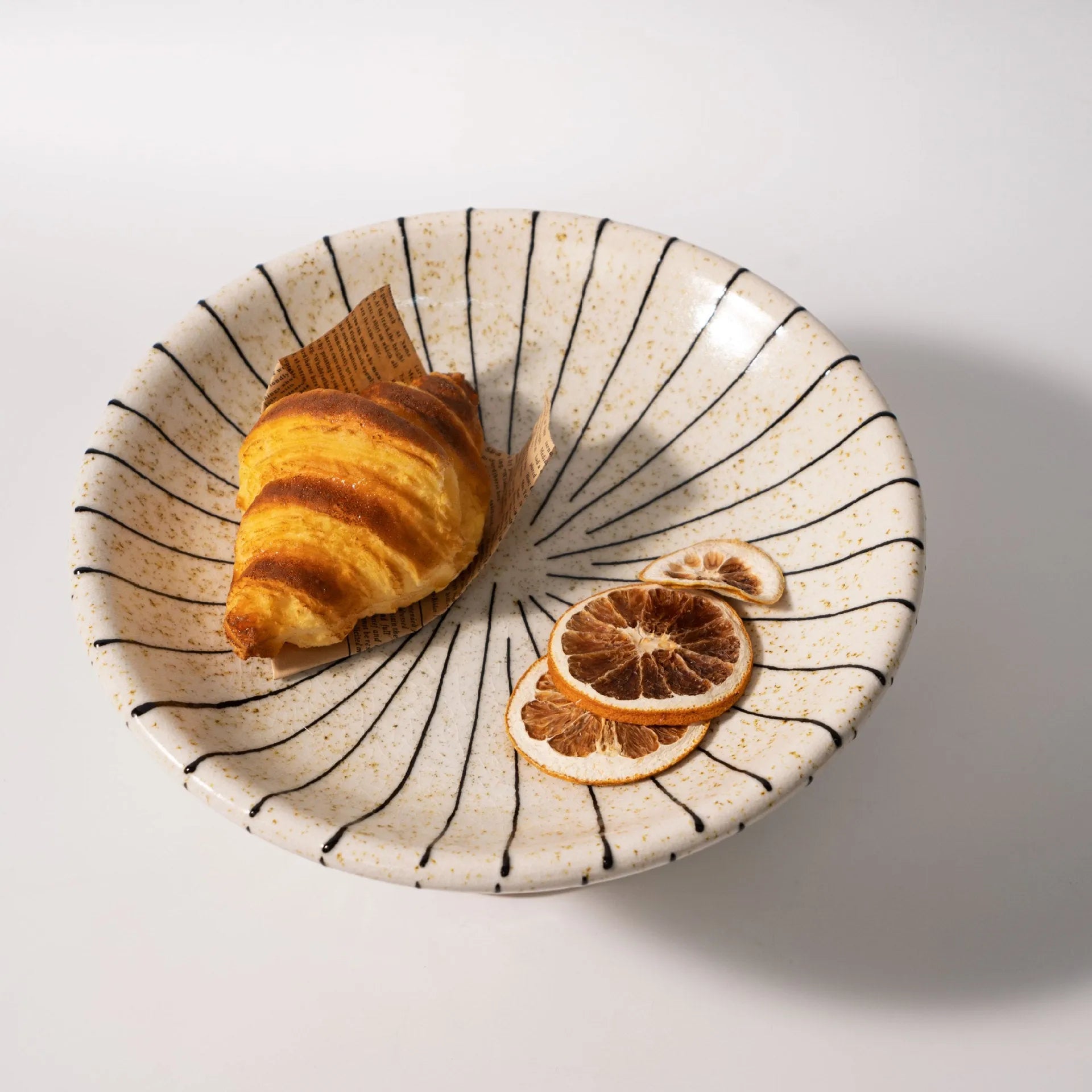 Black and white striped fruit pattern dessert plate made from plastic resin