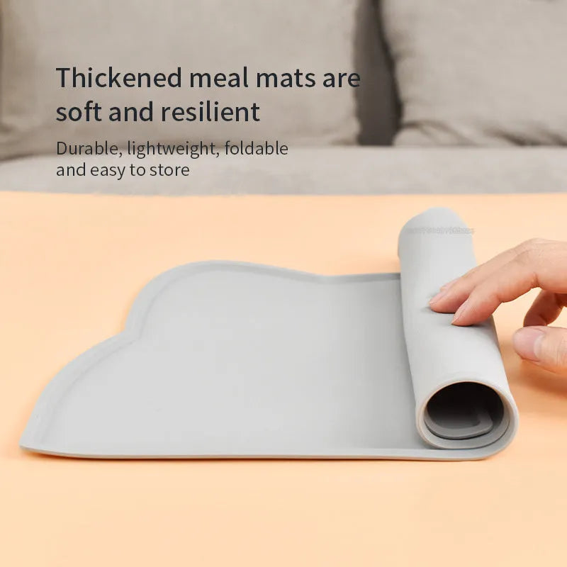 Blue silicone waterproof pet feeding mat with cat head shape, 44 by 24 centimetres