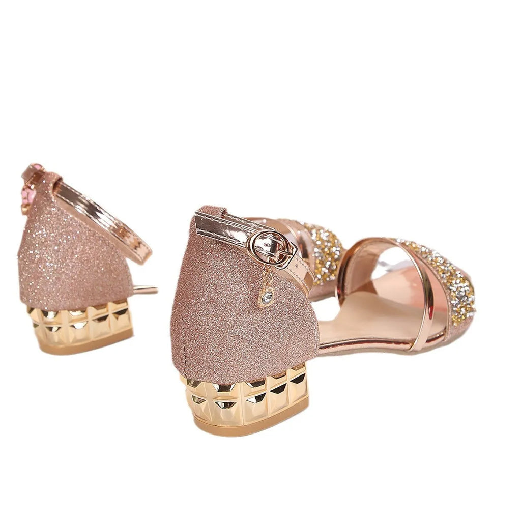 Women's plus size Roman style sandals with rhinestone detail, open toe, and buckle fastening.