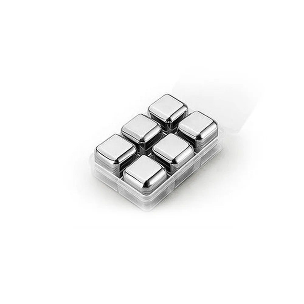 Set of 8 stainless steel ice cubes in square and ball shapes with plastic storage box and tong on a wooden surface