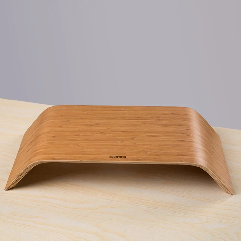 Walnut wood laptop stand with bamboo leather colour finish, 23x51x9cm dimensions, on a desk