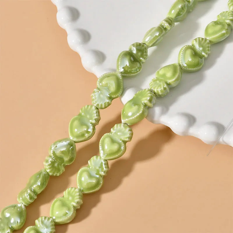 Ceramic love heart beads in assorted colours, 10x15mm with 1.7mm hole, 20-piece pack
