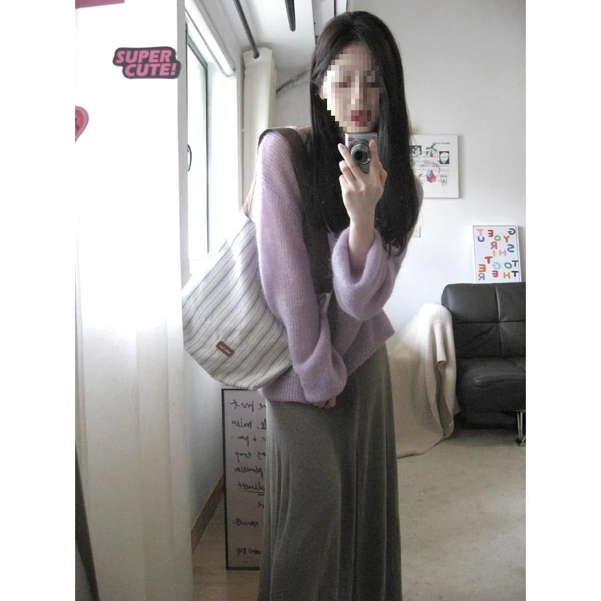 Purple loose-fitting women's blouse made of ice silk with sleeveless princess sleeves.