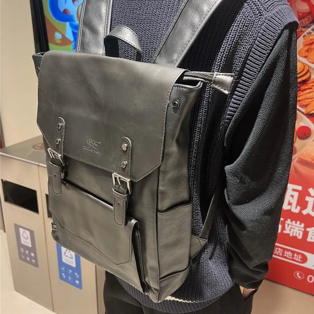 Unisex large capacity travel backpack in black PU with solid colour design