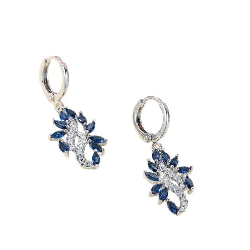 Women's simple minority all-match earrings in platinum sapphire blue alloy on display