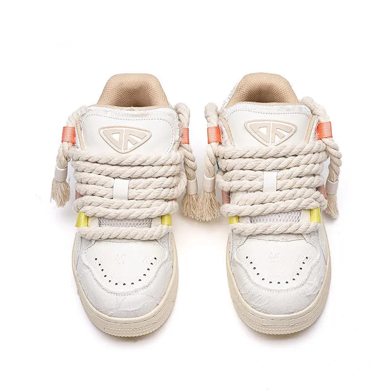 Creamy white retro skateboard trainers with old damage lace and round toe on rubber sole