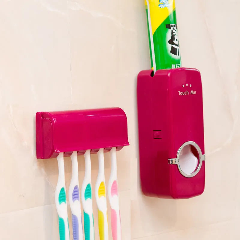 White and wine red plastic silicone toothbrush holder set with suction mount on a bathroom tile wall