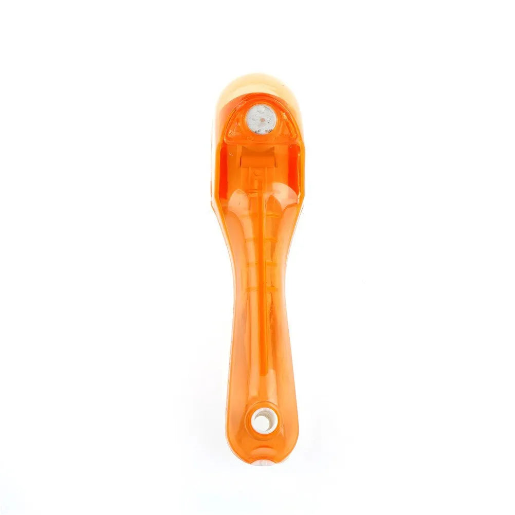 Orange and blue digital measuring spoons with magnetic snap showing nested storage on a fridge surface