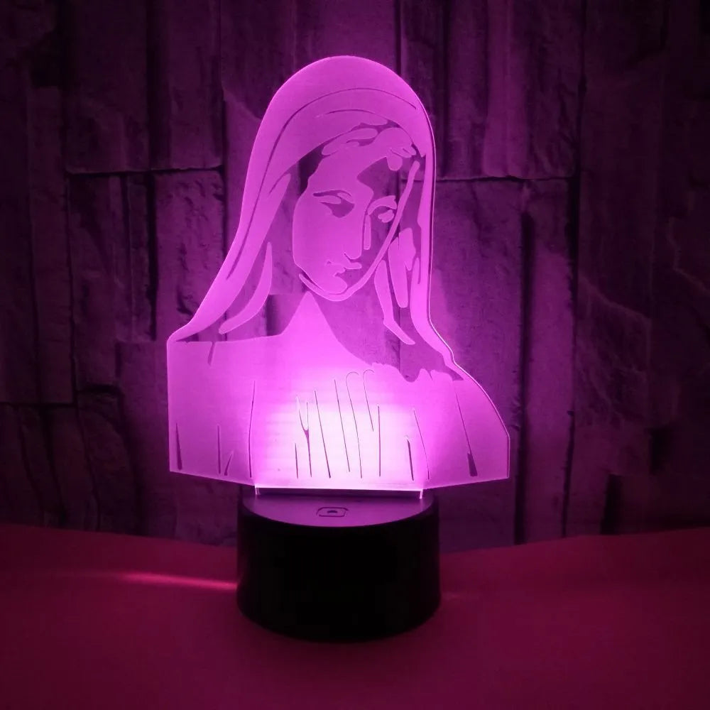 3D LED night light showing colourful dual ring pattern, with remote control and USB cable.