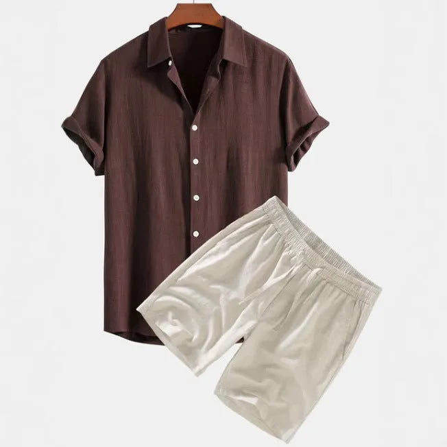 Men's solid colour casual short-sleeved shirt and shorts suit in polyester fibre, side view on model.