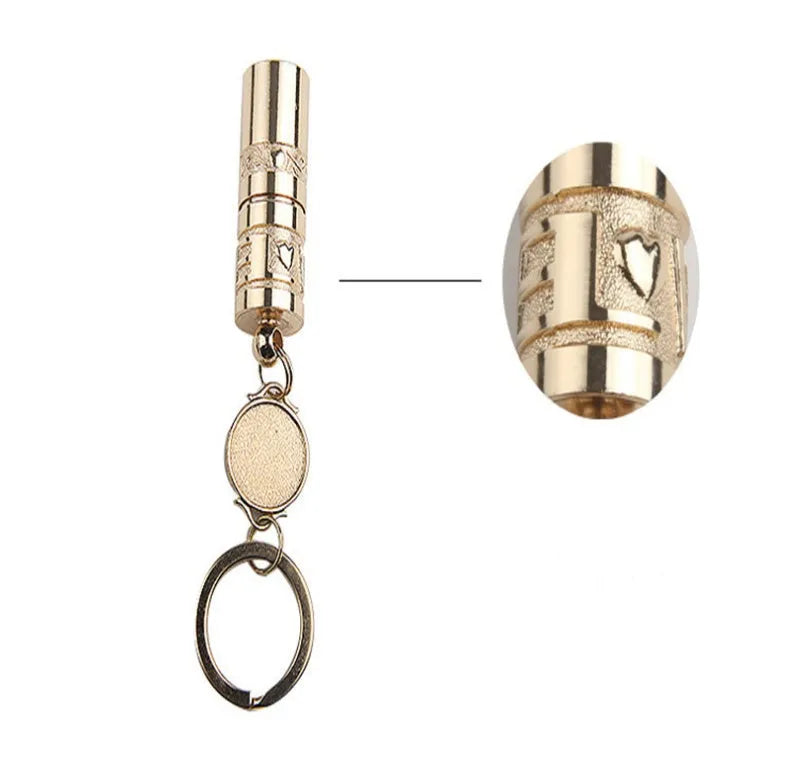 Gold-coloured zinc alloy waterproof mini LED keychain flashlight on a keyring.