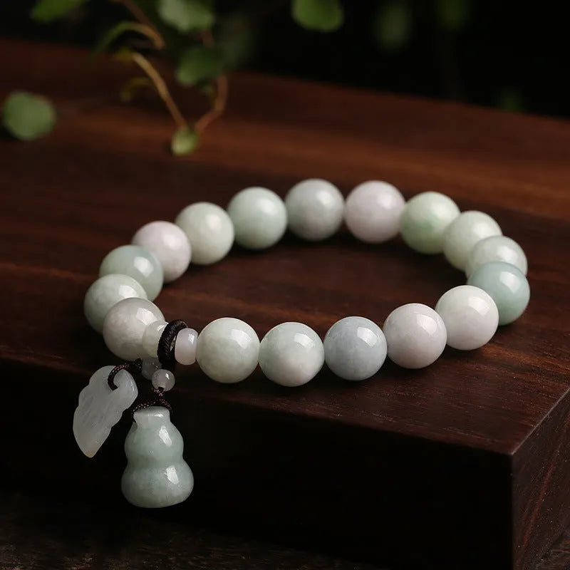Natural emerald jade bracelet with geometric design and Maitreya Buddha hanging charm