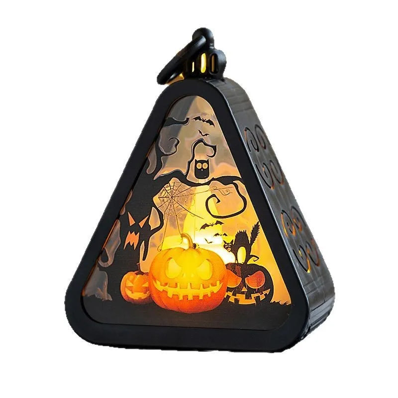 Halloween pumpkin lantern decoration with battery-powered light in one of four colour designs