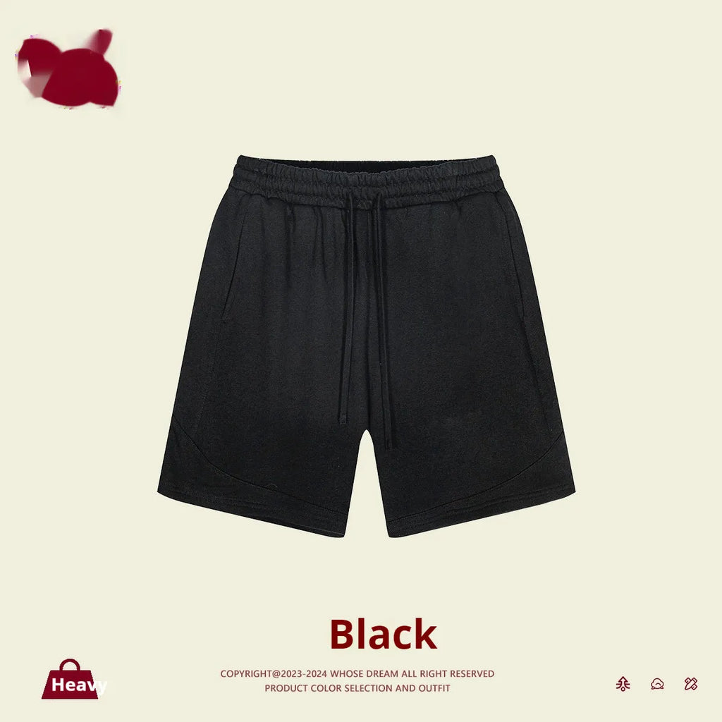 Solid colour loose cotton children's sports shorts in black, navy blue, mixed grey, and brown